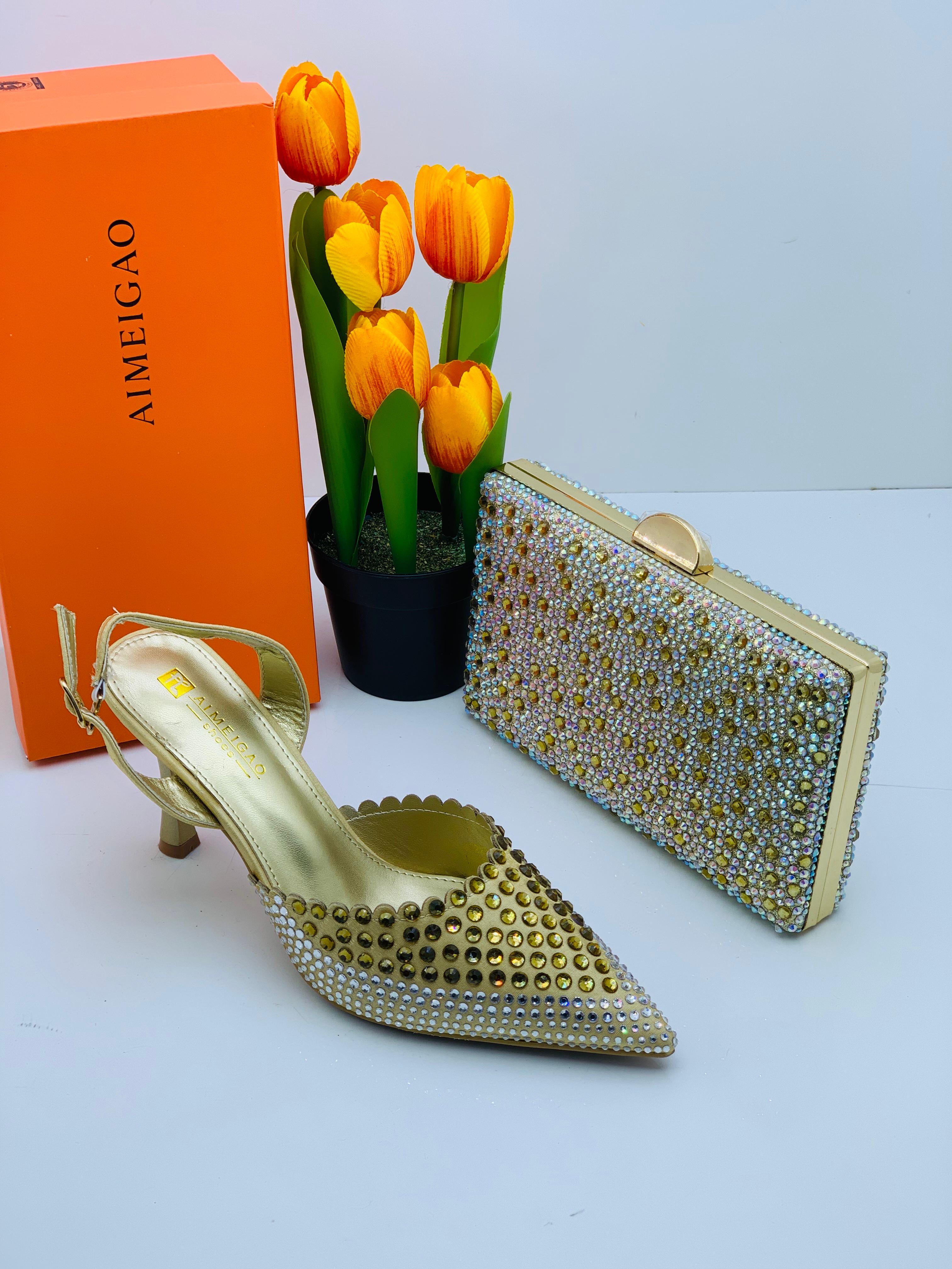 Ensemble sac a main dame et babouche à talon 