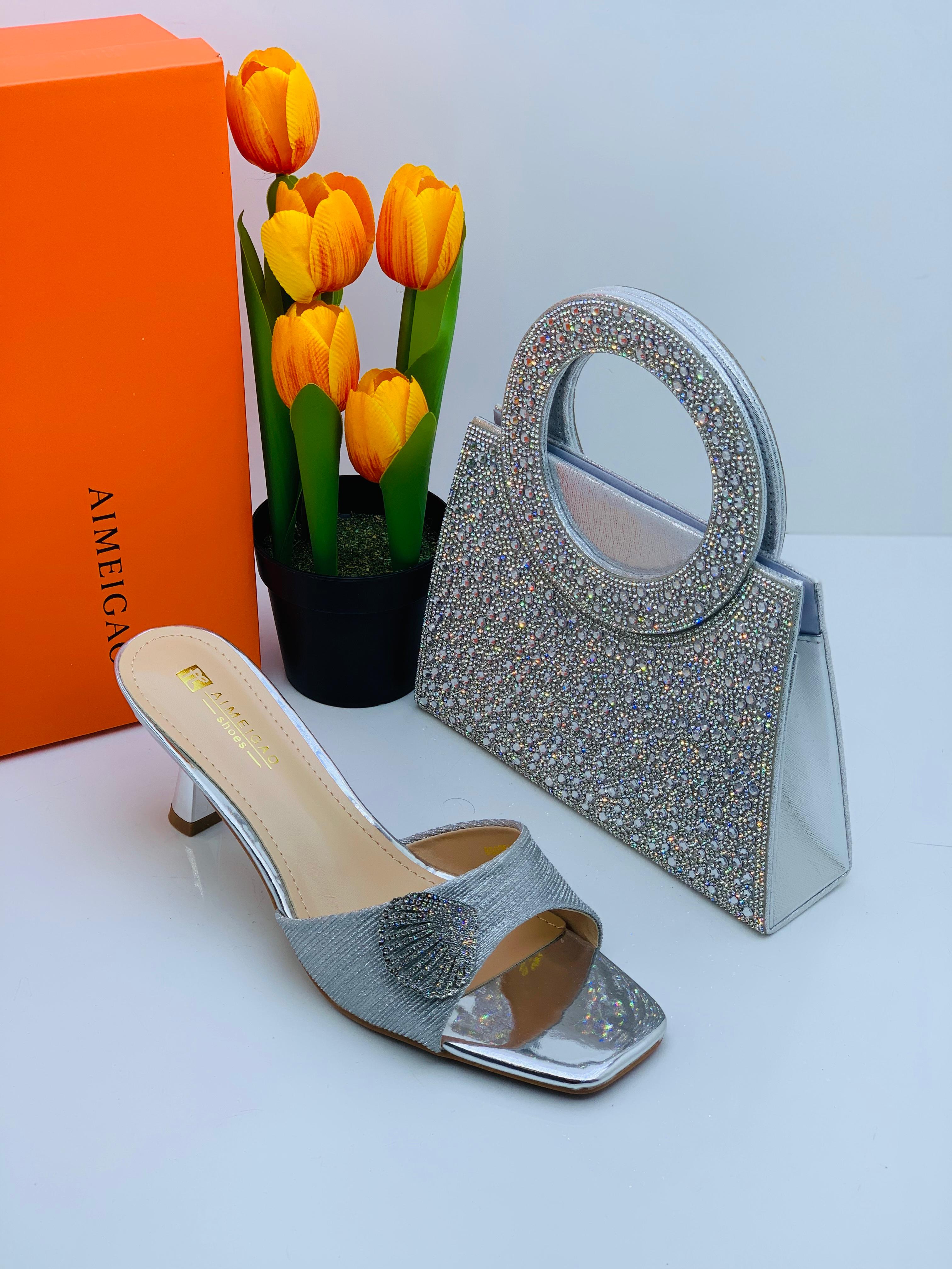 Ensemble sac a main dame et babouche à talon 