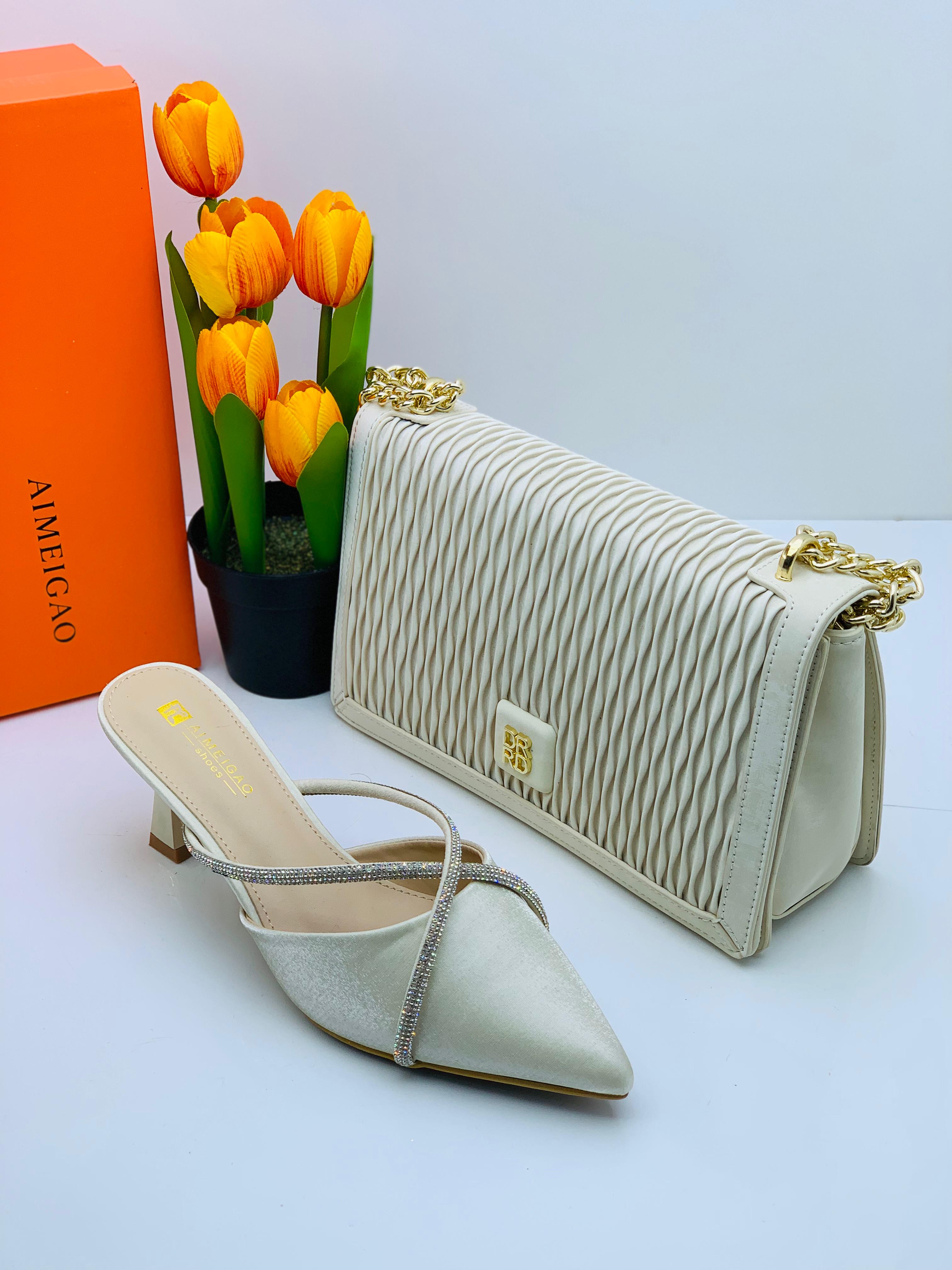 Ensemble sac a main dame et babouche à talon 