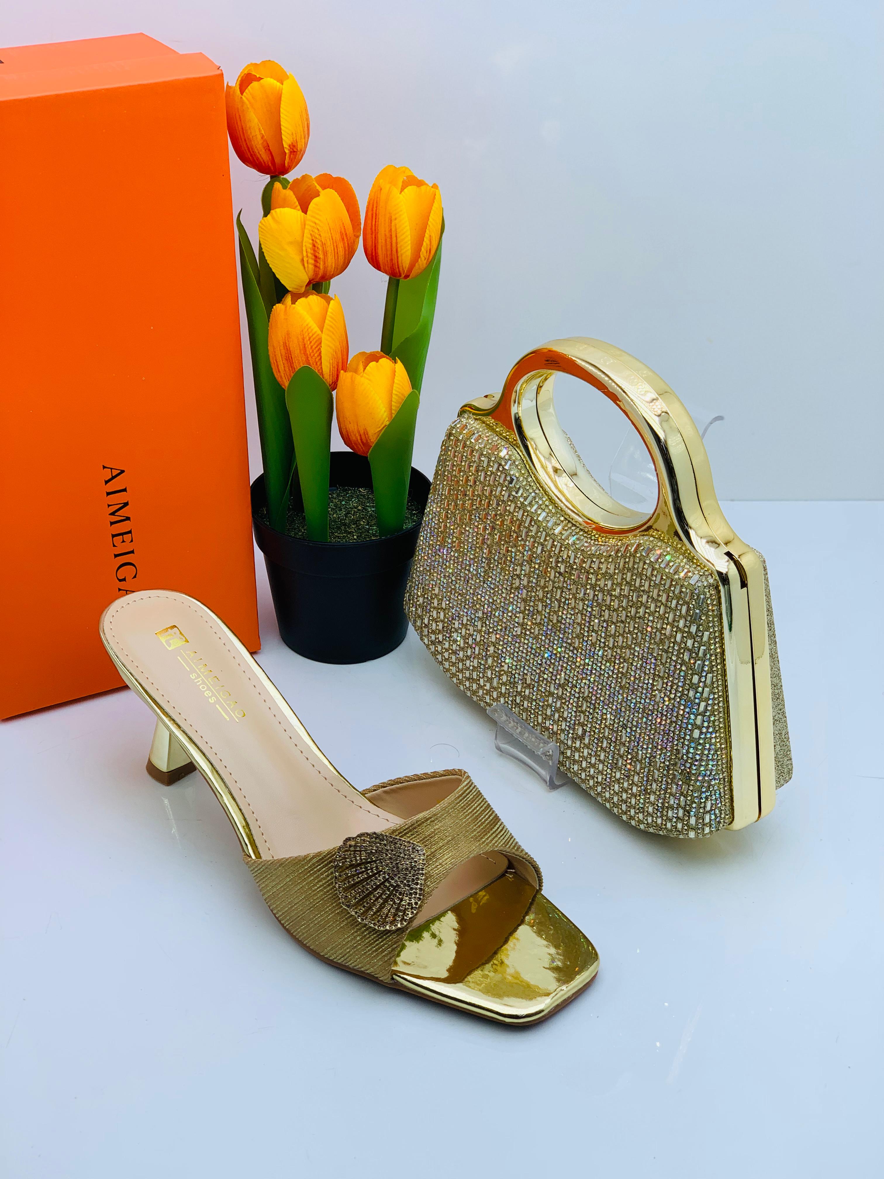 Ensemble sac a main dame et babouche à talon 